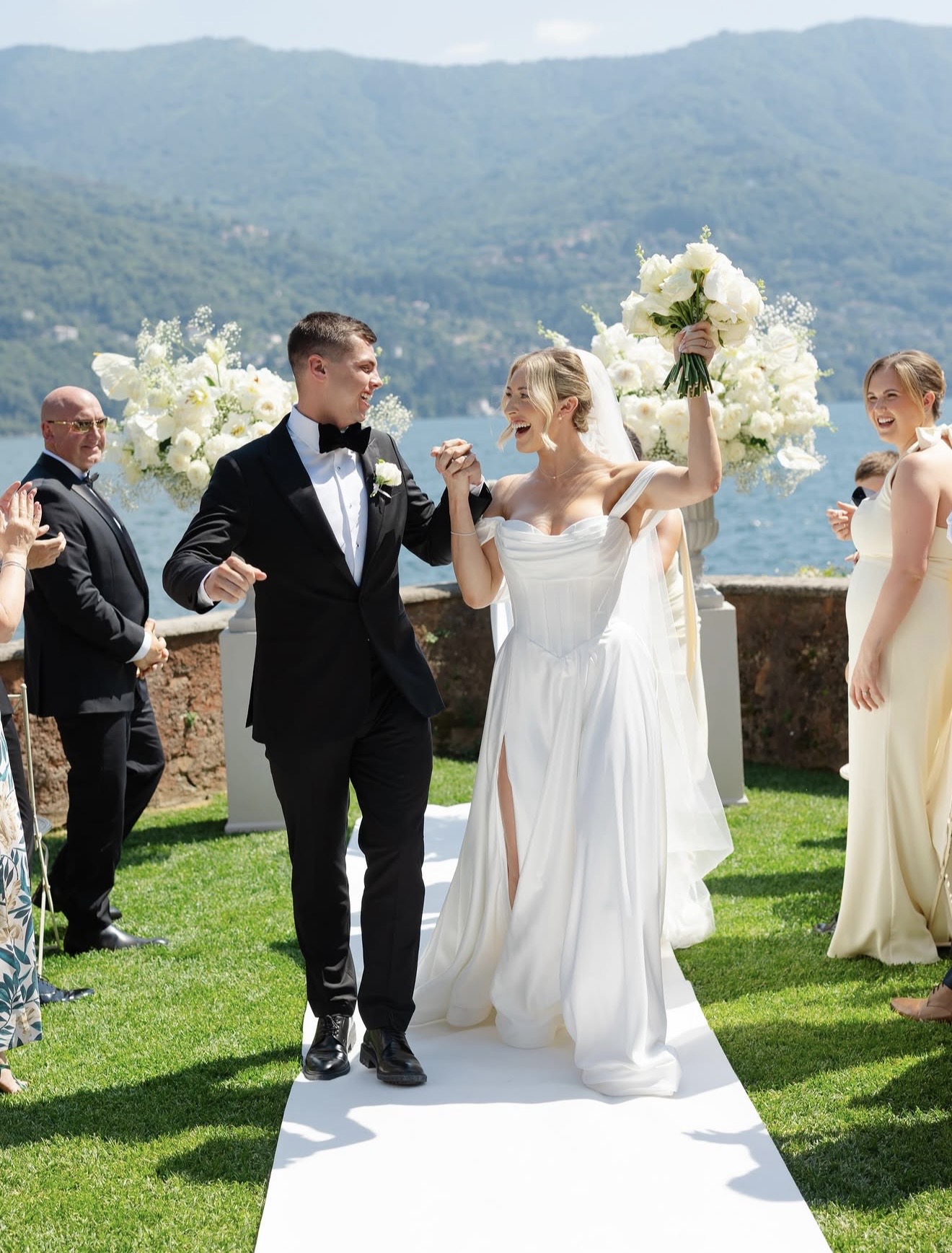 Bride and groom at lakeside ceremony